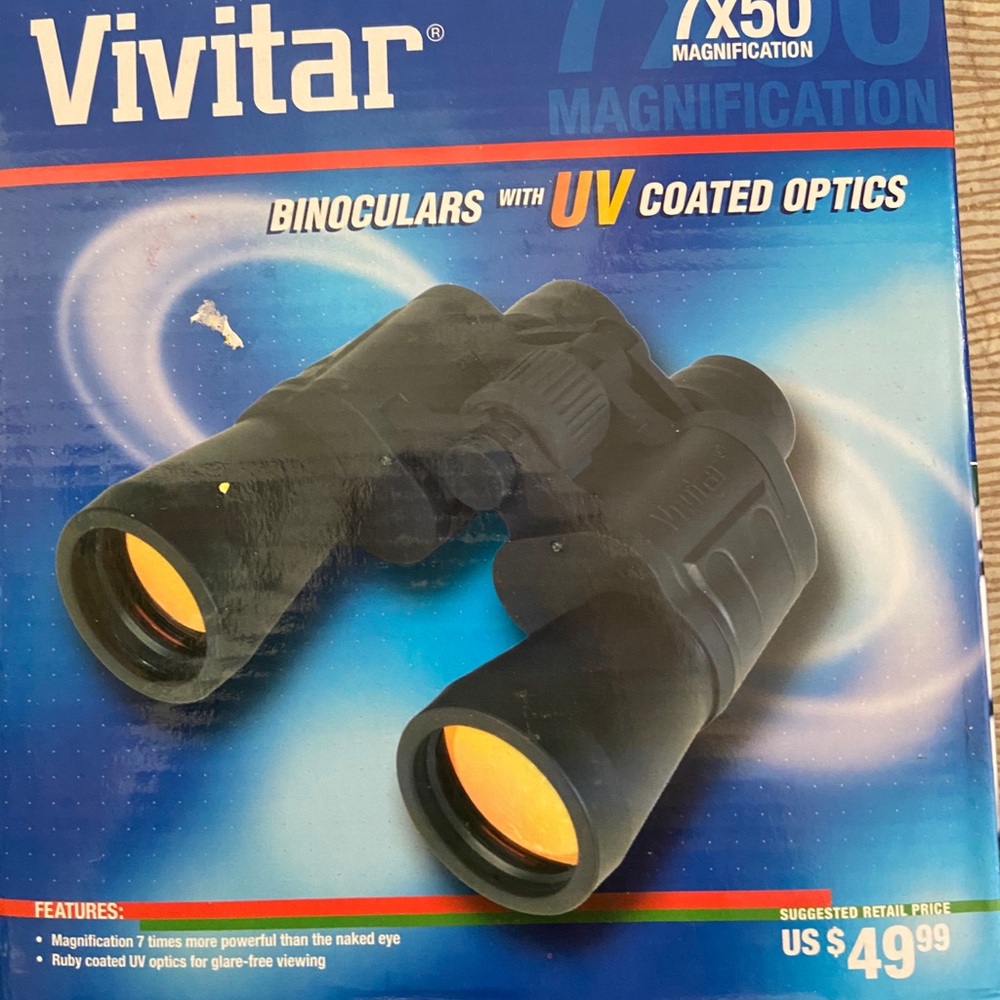 Unused binoculars with carrying case. 2 available